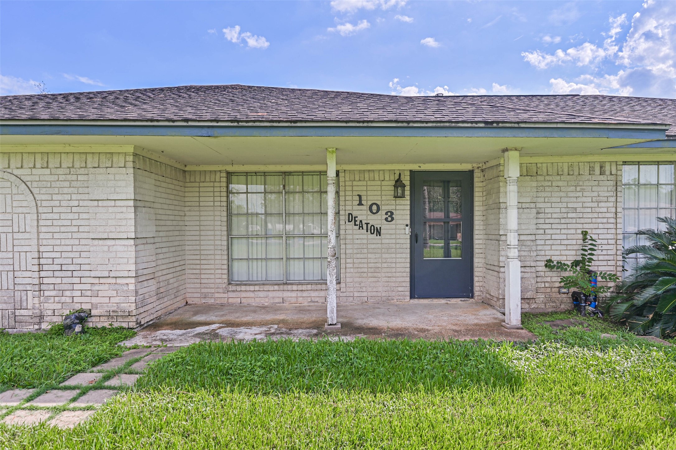 103 Deaton Street Freeport, TX 77541 - Photo 8 of 25 a view of a pool with a yard