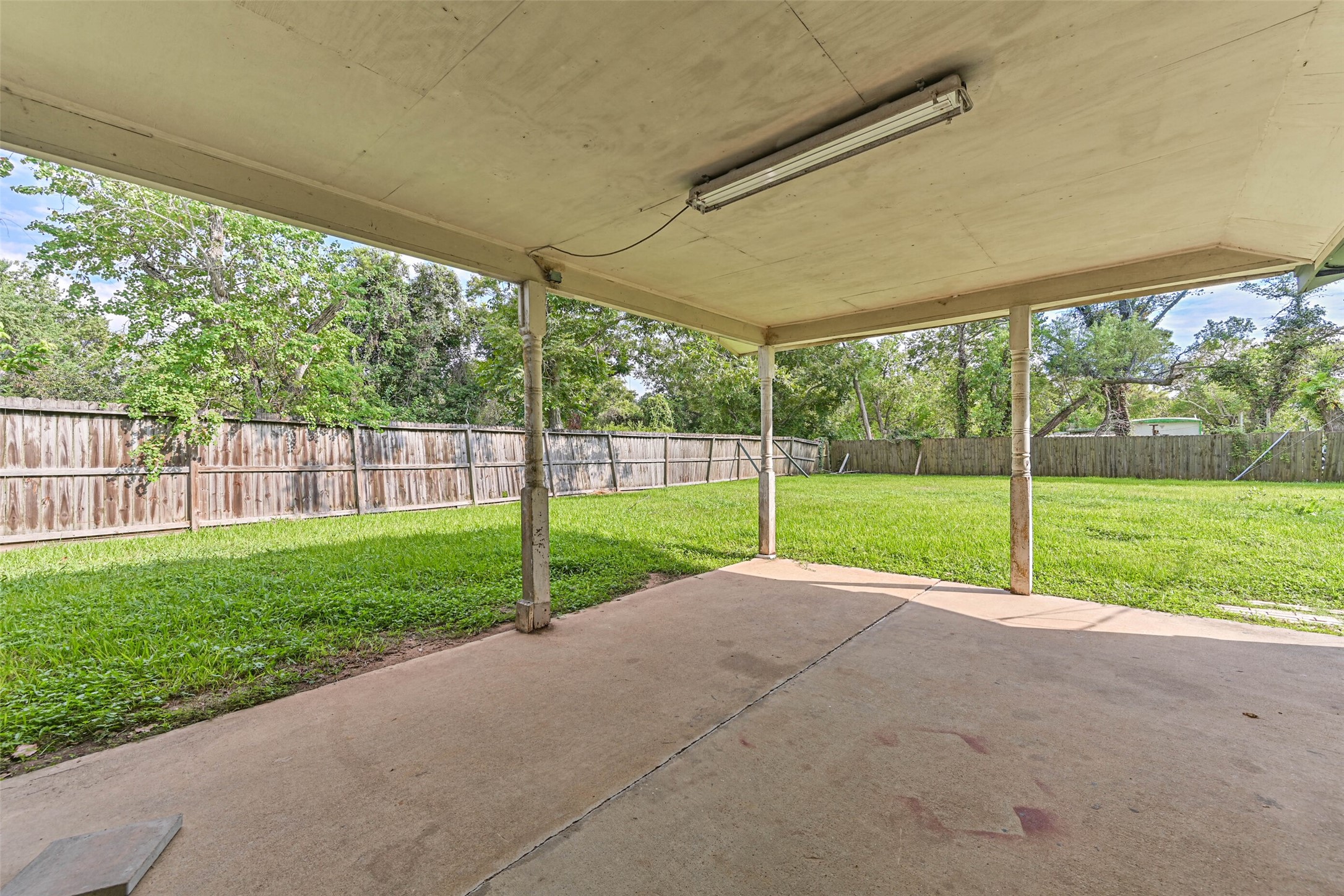 103 Deaton Street Freeport, TX 77541 - Photo 9 of 25 a view of a yard with porch