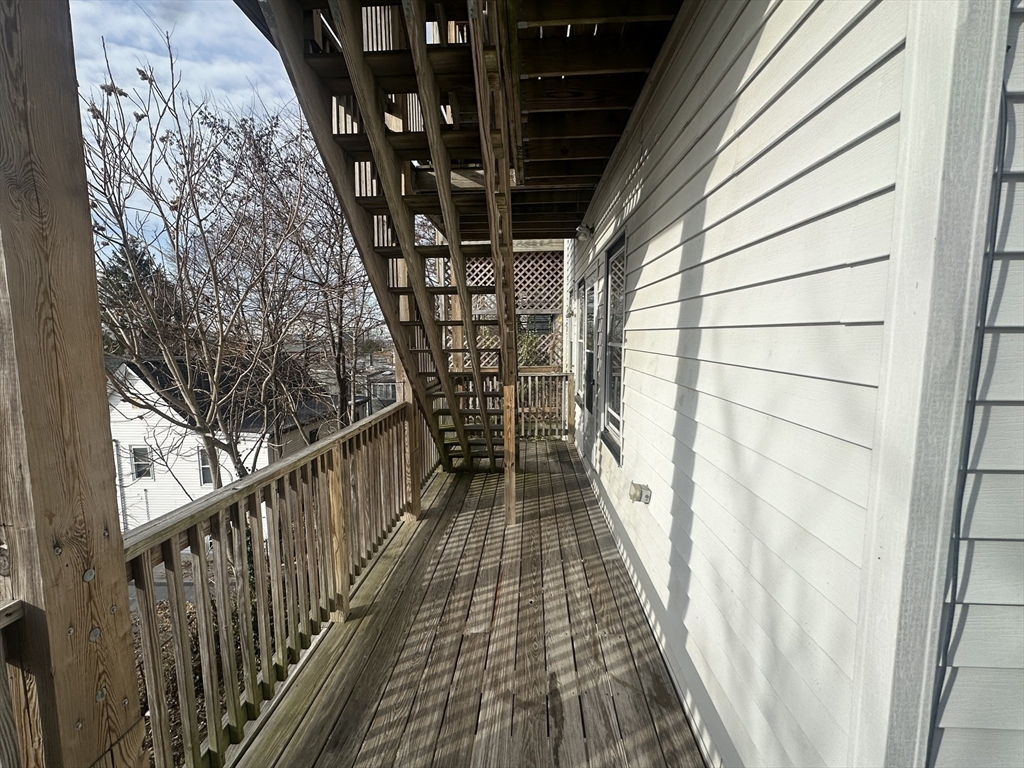 118 Gladstone Street, Unit B Boston, MA 02128 - Photo 15 of 16 a view of entryway with wooden floor