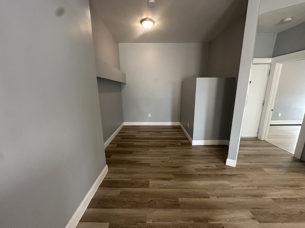 118 Gladstone Street, Unit B Boston, MA 02128 - Photo 6 of 16 a view of entryway with wooden floor