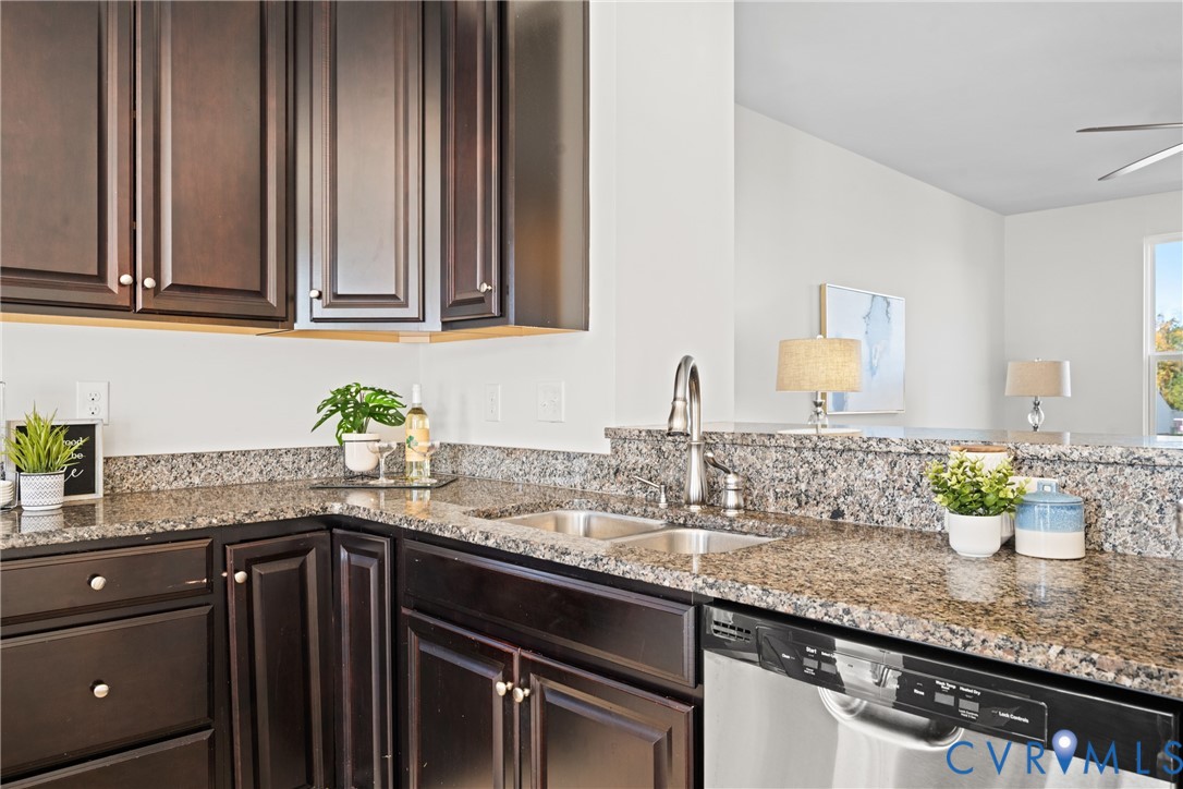 7849 Chasing Lane Richmond, VA 23237 - Photo 14 of 29 Kitchen featuring dark brown cabinets, dishwasher,