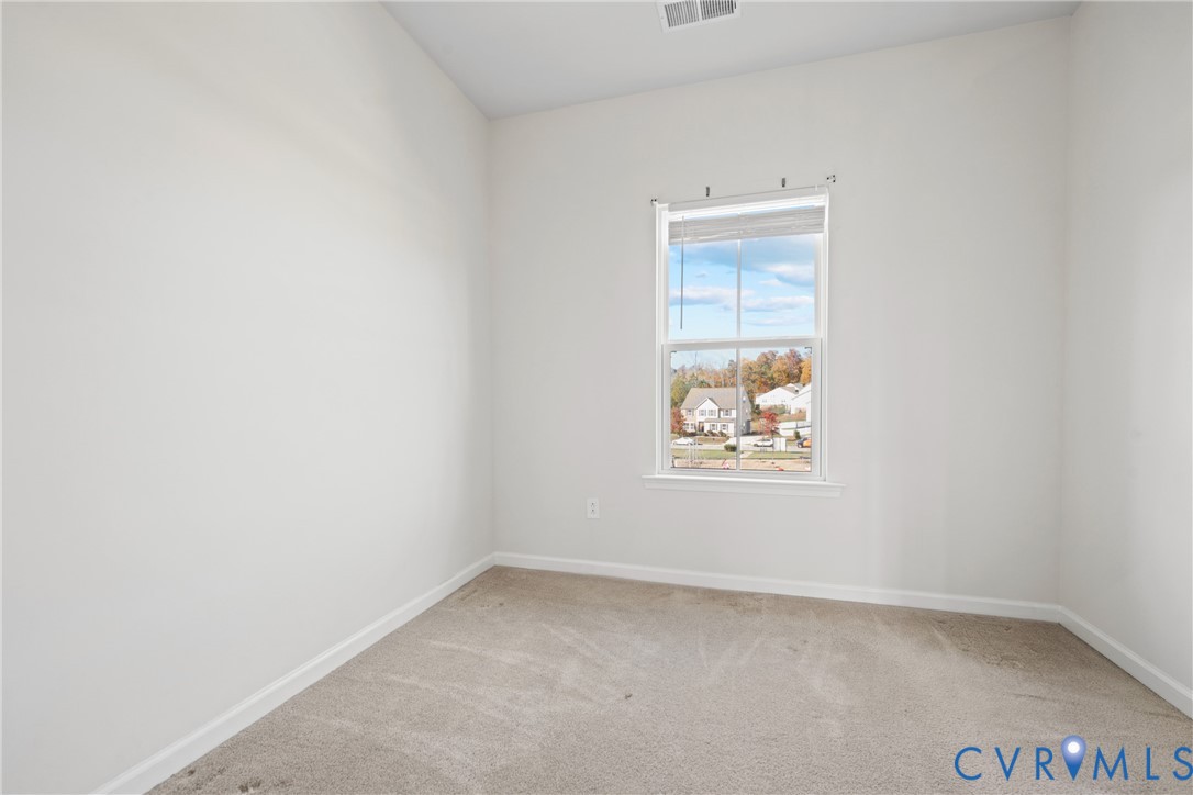 7849 Chasing Lane Richmond, VA 23237 - Photo 24 of 29 Unfurnished room featuring carpet flooring and bas
