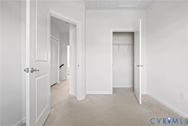 a view of a room with a wardrobe space