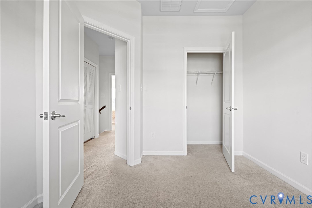 7849 Chasing Lane Richmond, VA 23237 - Photo 25 of 29 Unfurnished bedroom featuring light colored carpet