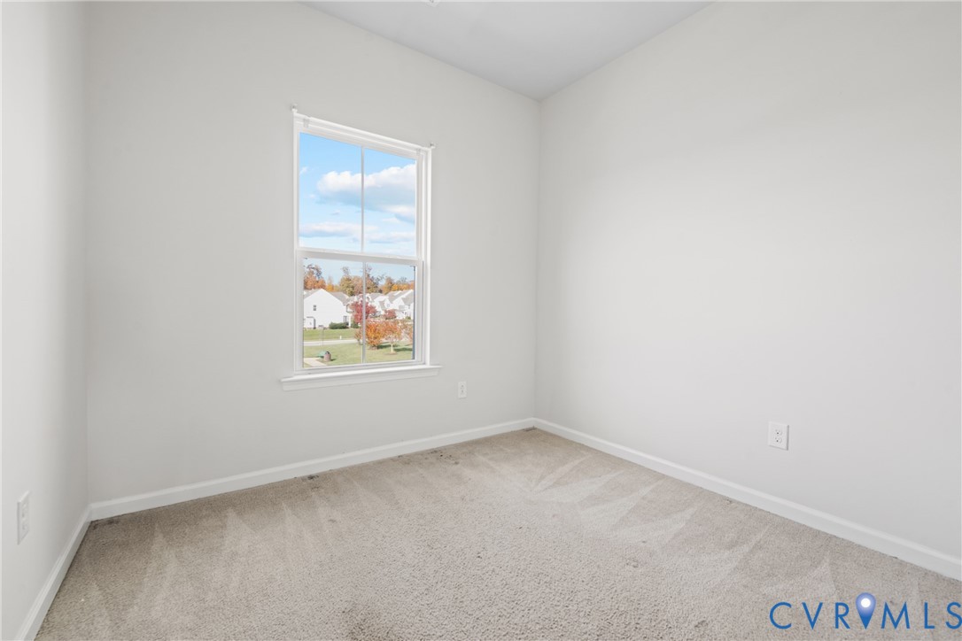 7849 Chasing Lane Richmond, VA 23237 - Photo 26 of 29 Carpeted empty room with baseboards