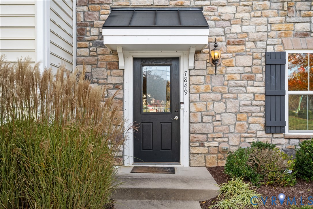 7849 Chasing Lane Richmond, VA 23237 - Photo 3 of 29 View of exterior entry with stone siding
