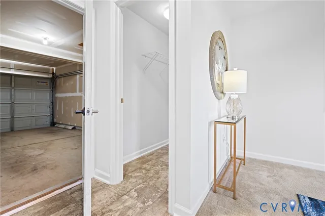 a room with a mirror and a shower