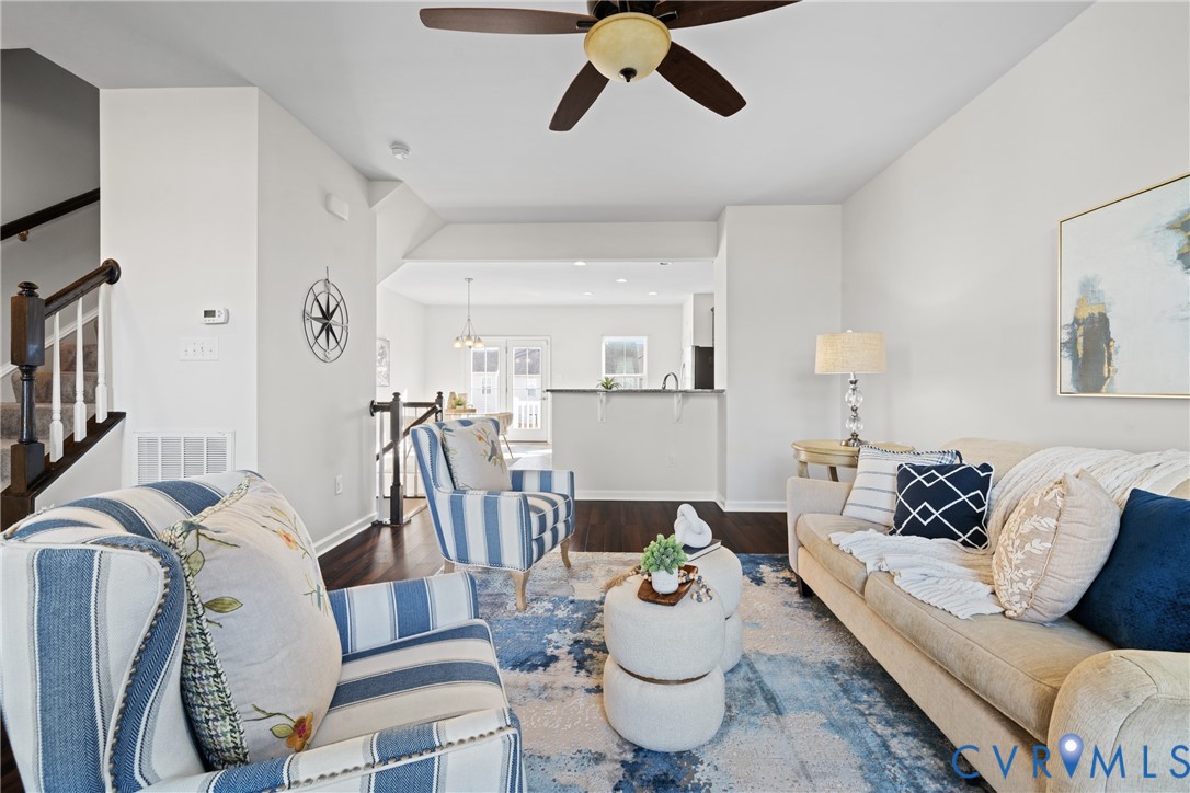7849 Chasing Lane Richmond, VA 23237 - Photo 9 of 29 Living area with dark wood-style flooring and ceil