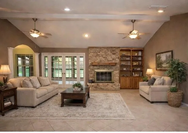 a view of an empty room with glass door