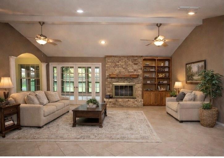 1305 Cliff Drive Graham, TX 76450 - Photo 11 of 37 a living room with furniture ceiling fan and a fireplace