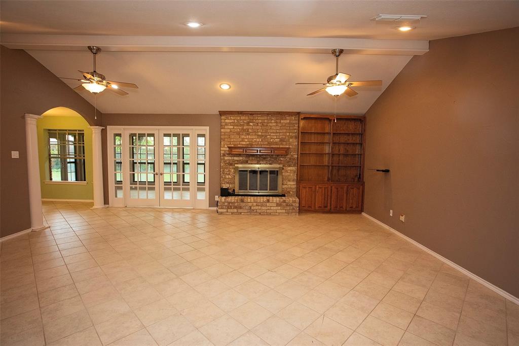 1305 Cliff Drive Graham, TX 76450 - Photo 12 of 37 wooden floor in an empty room with a window