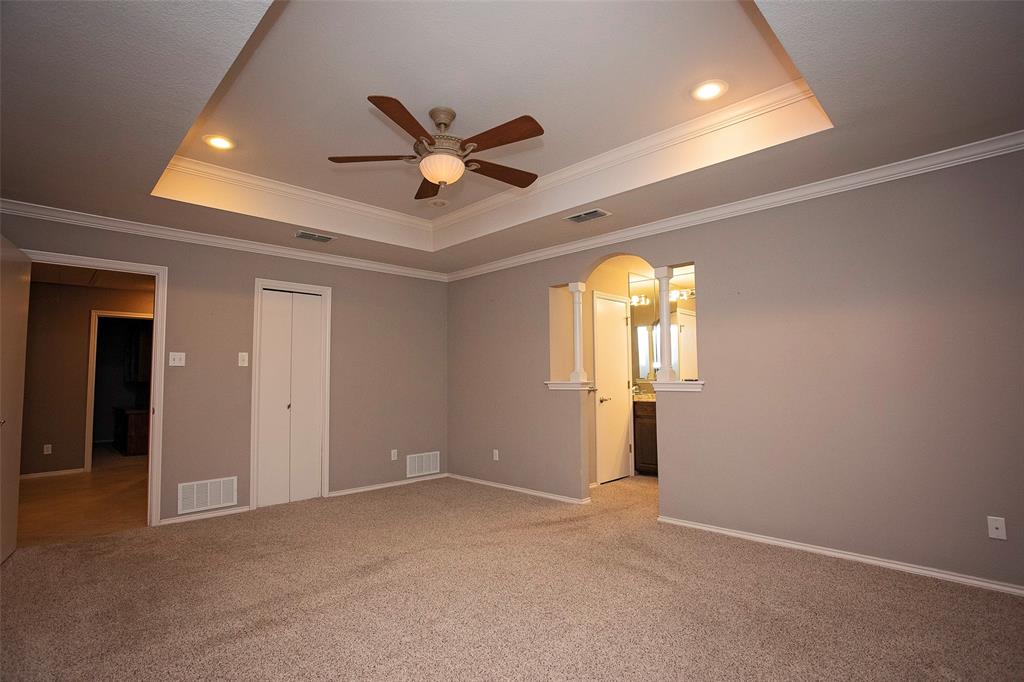1305 Cliff Drive Graham, TX 76450 - Photo 21 of 32 wooden floor in an empty room with a window