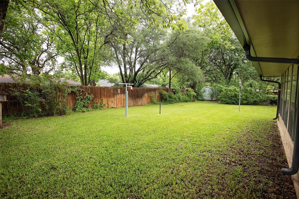 1305 Cliff Drive Graham, TX 76450 - Photo 8 of 32 a view of a field with a tree