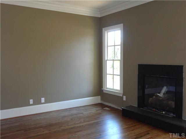 1417 Dellwood Drive Raleigh, NC 27607 - Photo 3 of 23 This can be a study or a formal living room with a fireplace. The mantle is being custom built. There is a granite surround for the fireplace.
