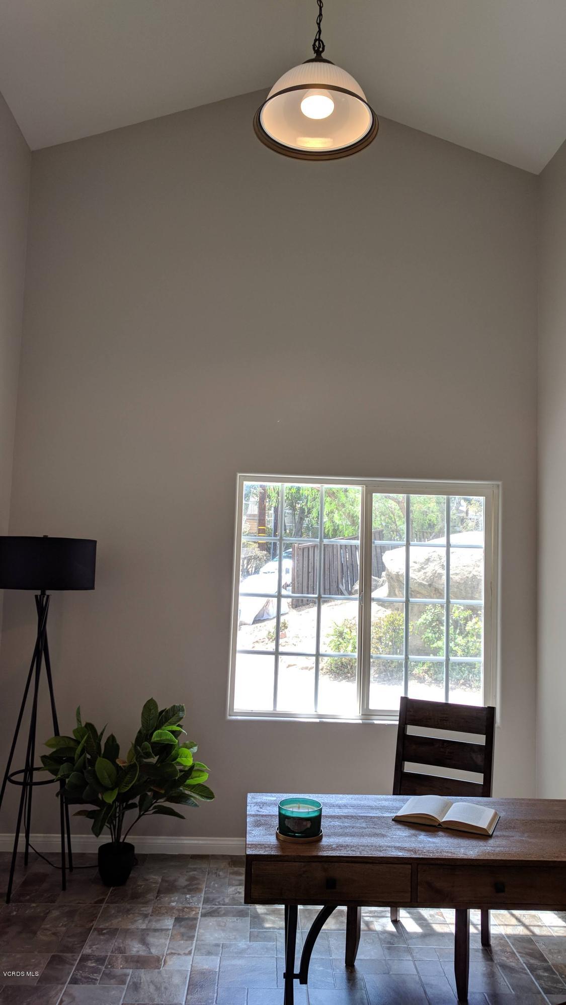 913 Alta Vista Road Simi Valley, CA 93063 - Photo 8 of 25 a view of a room with a window and furniture