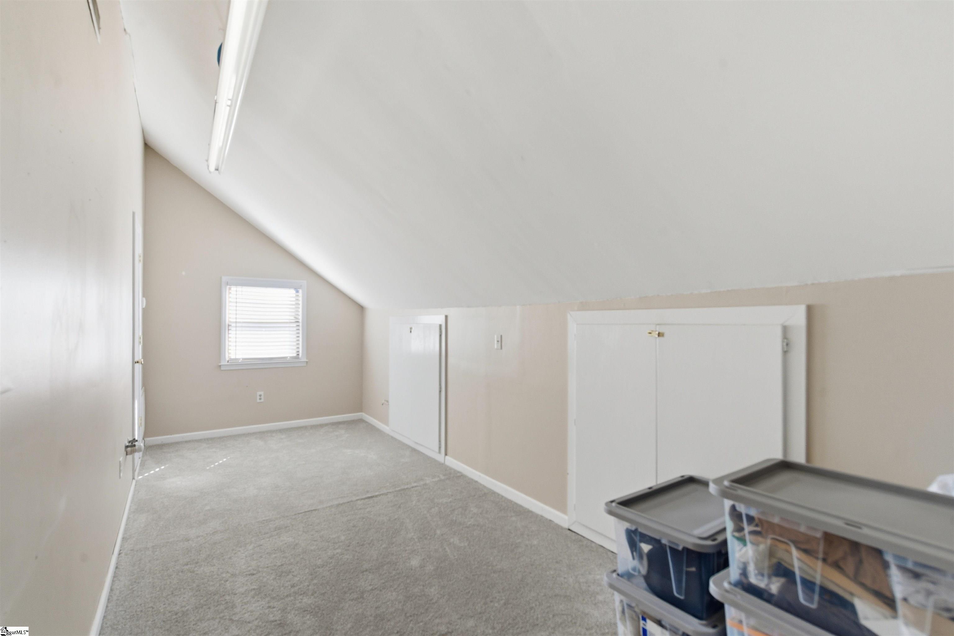 208 State Rd S-30-874 Clinton, SC 29325 - Photo 24 of 29 Those doors open up along the side walls to more storage areas!