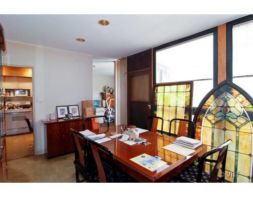 562 West Stratford Place Chicago, IL 60657 - Photo 4 of 10 a view of a dining room with furniture and a large window
