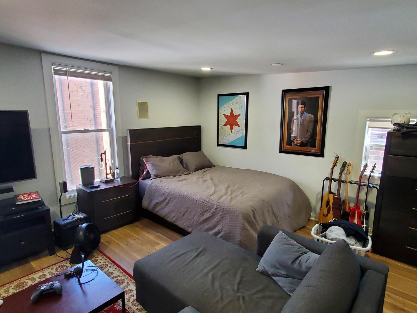 1127 West George Street Chicago, IL 60657 - Photo 15 of 16 a bedroom with a bed and a window