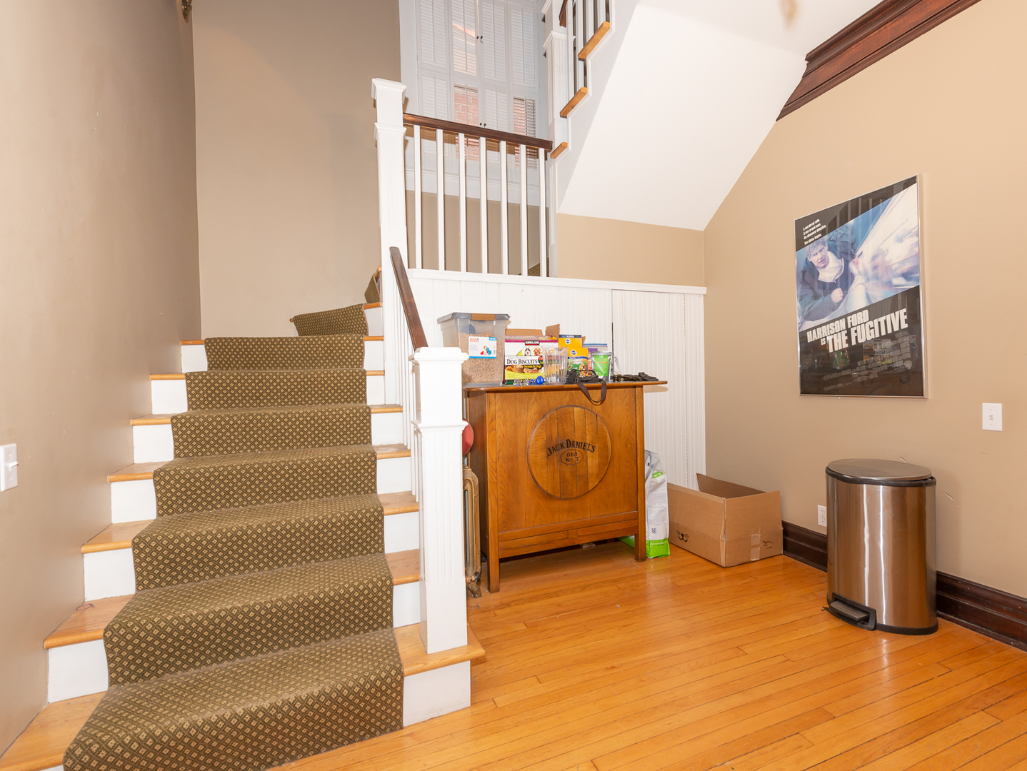 1127 West George Street Chicago, IL 60657 - Photo 7 of 16 a view of a livingroom with furniture and stairs