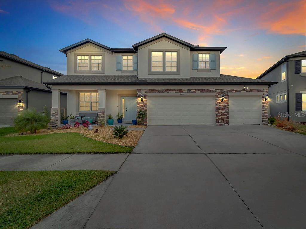 7406 Sweeter Tide Trail Wesley Chapel, FL 33545 - Photo 2 of 74 a view of a street sign of the house