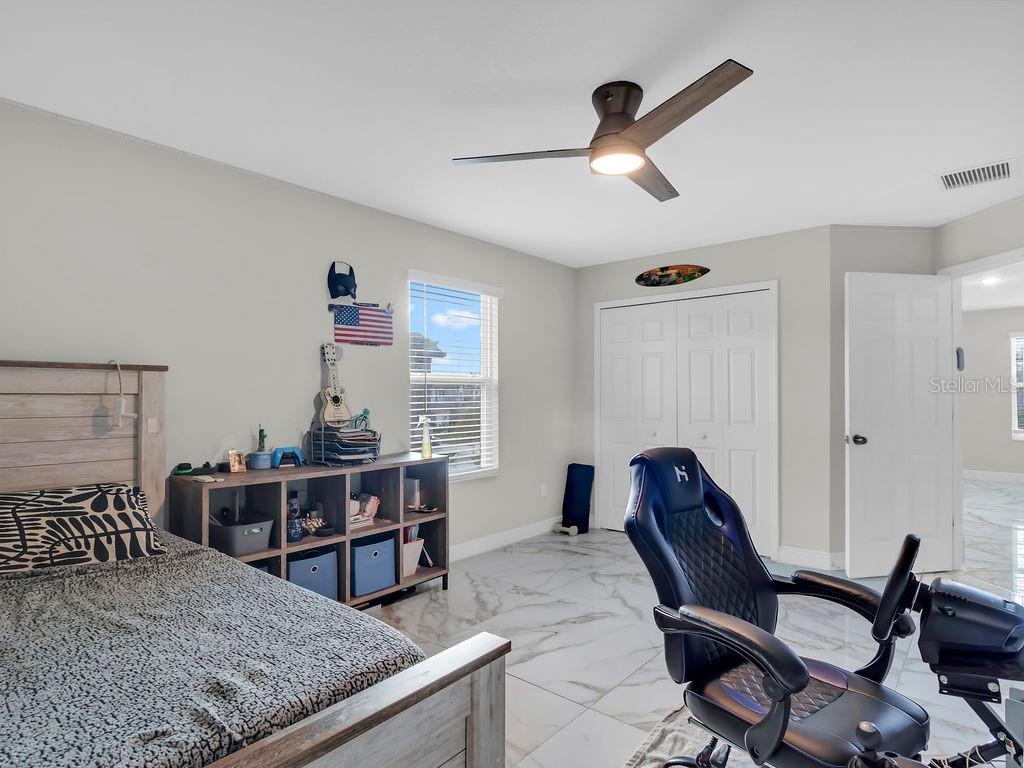 7406 Sweeter Tide Trail Wesley Chapel, FL 33545 - Photo 45 of 74 a view of a workspace with furniture