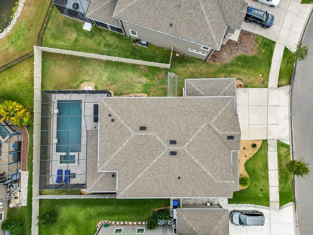 7406 Sweeter Tide Trail Wesley Chapel, FL 33545 - Photo 64 of 74 an aerial view of a house with a yard