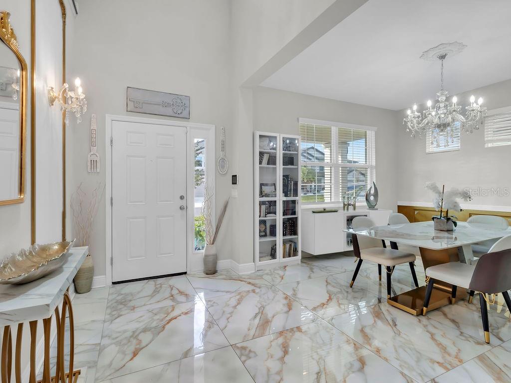 7406 Sweeter Tide Trail Wesley Chapel, FL 33545 - Photo 9 of 74 a view of a livingroom with furniture and window