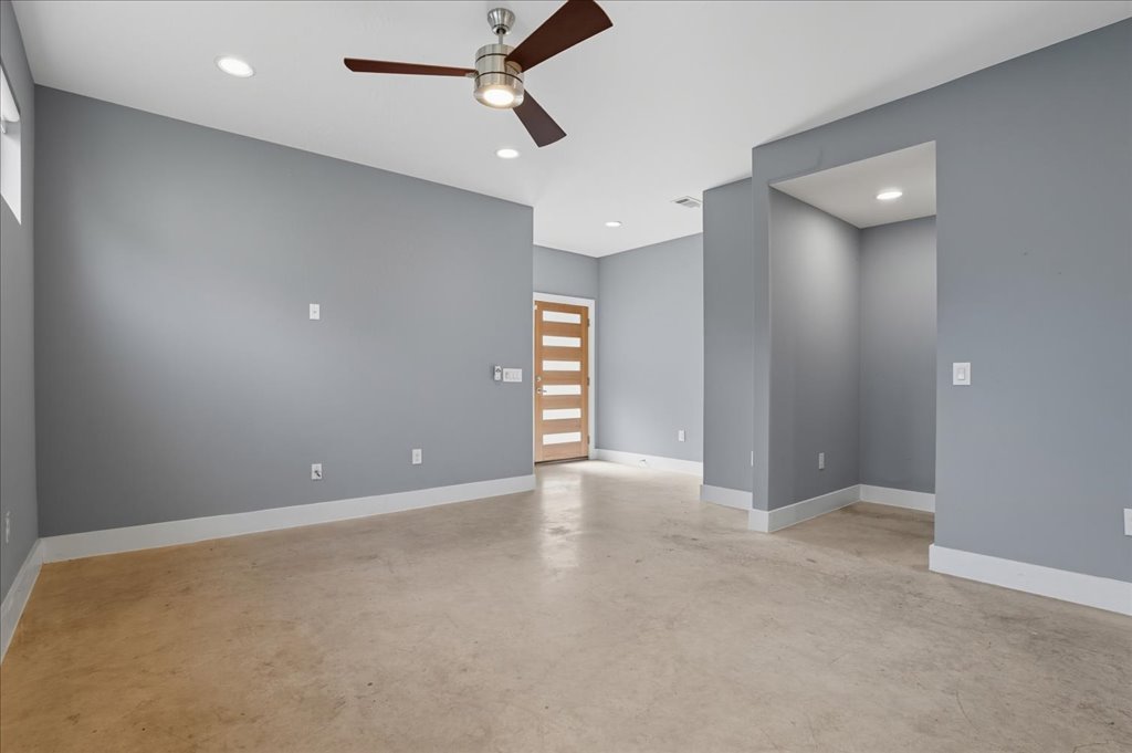 6902 Bennett Avenue, Unit B Austin, TX 78752 - Photo 7 of 27 Spare room featuring concrete floors, recessed lighting, and a ceiling fan