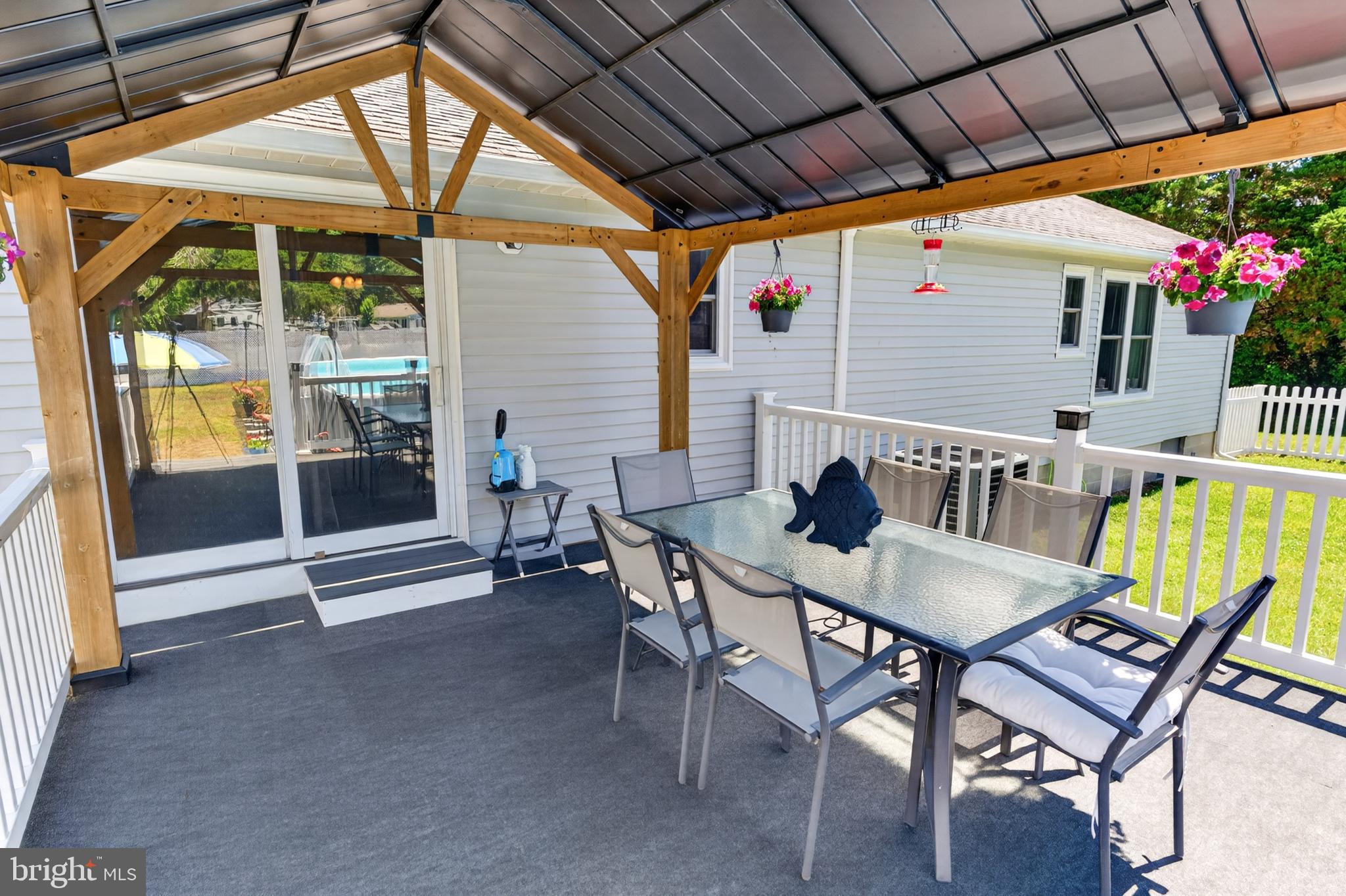 5440 Moose Lodge Road Cambridge, MD 21613 - Photo 44 of 63 Rear deck w/ covered entertaining space!