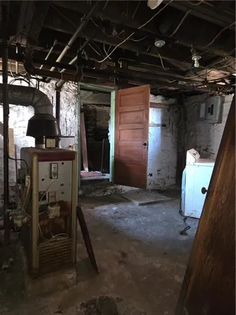 a view of room with wooden floor