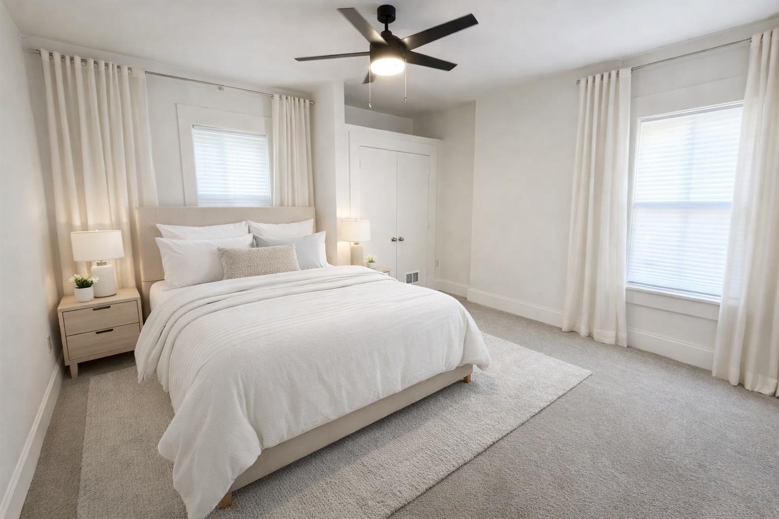 129 Talbot Avenue, Unit 103 Memphis, TN 38103 - Photo 4 of 5 Bedroom featuring ceiling fan and light carpet