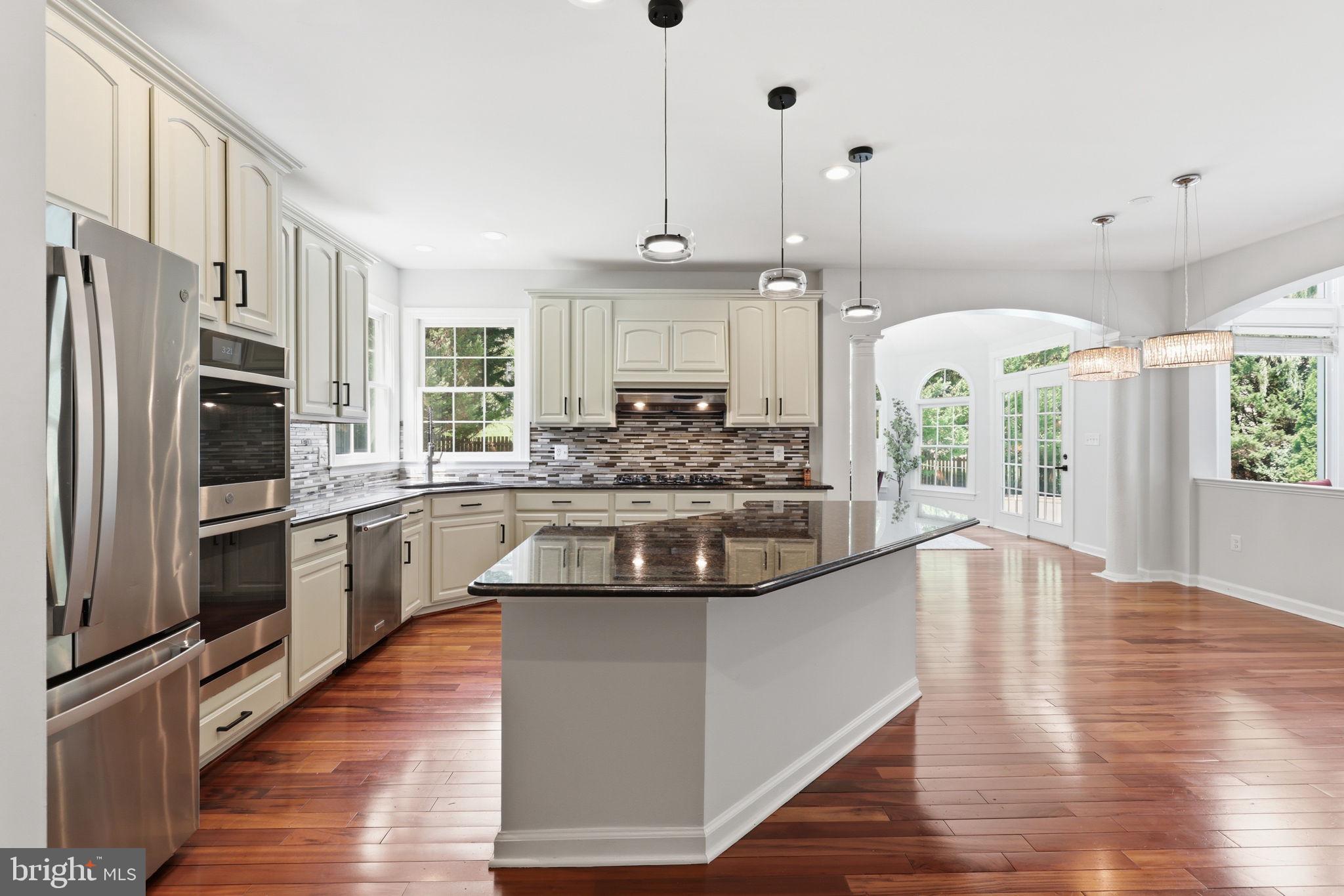 18426 Rim Rock Circle Leesburg, VA 20176 - Photo 25 of 60 Modern kitchen with elegant finishes.