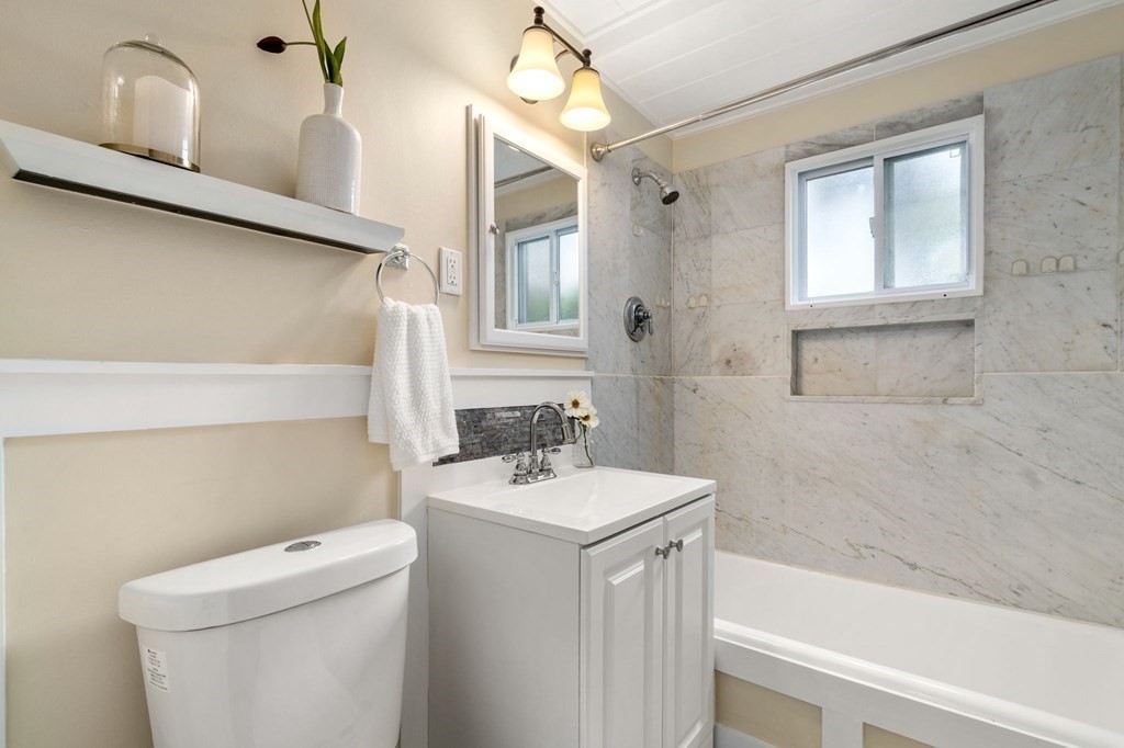23 Fuller Road, Unit 23 Watertown, MA 02472 - Photo 19 of 31 a bathroom with a sink a toilet and bathtub