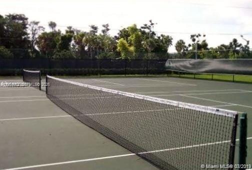 1235 Southwest 46th Avenue, Unit 711 Pompano Beach, FL 33069 - Photo 21 of 43 a view of a tennis court