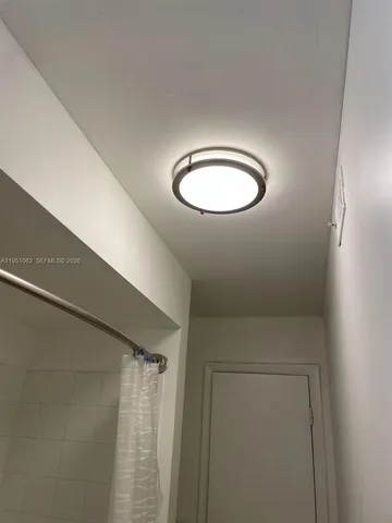 a view of a livingroom with wooden floor