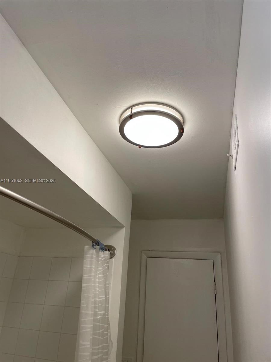 1235 Southwest 46th Avenue, Unit 711 Pompano Beach, FL 33069 - Photo 30 of 43 a view of a livingroom with wooden floor