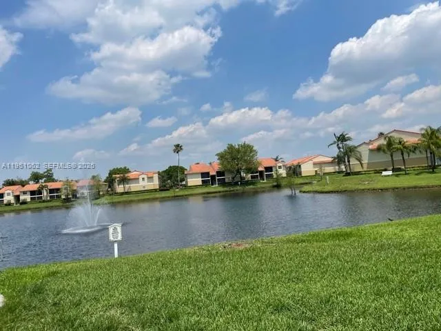 a view of a lake in front of house