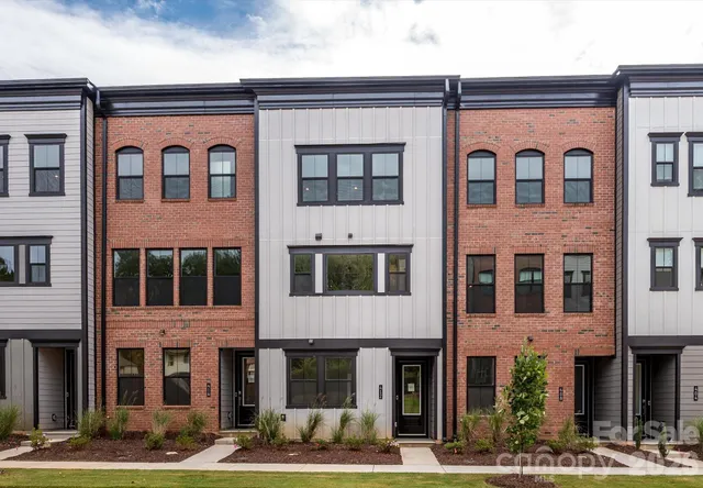 a front view of a building with windows