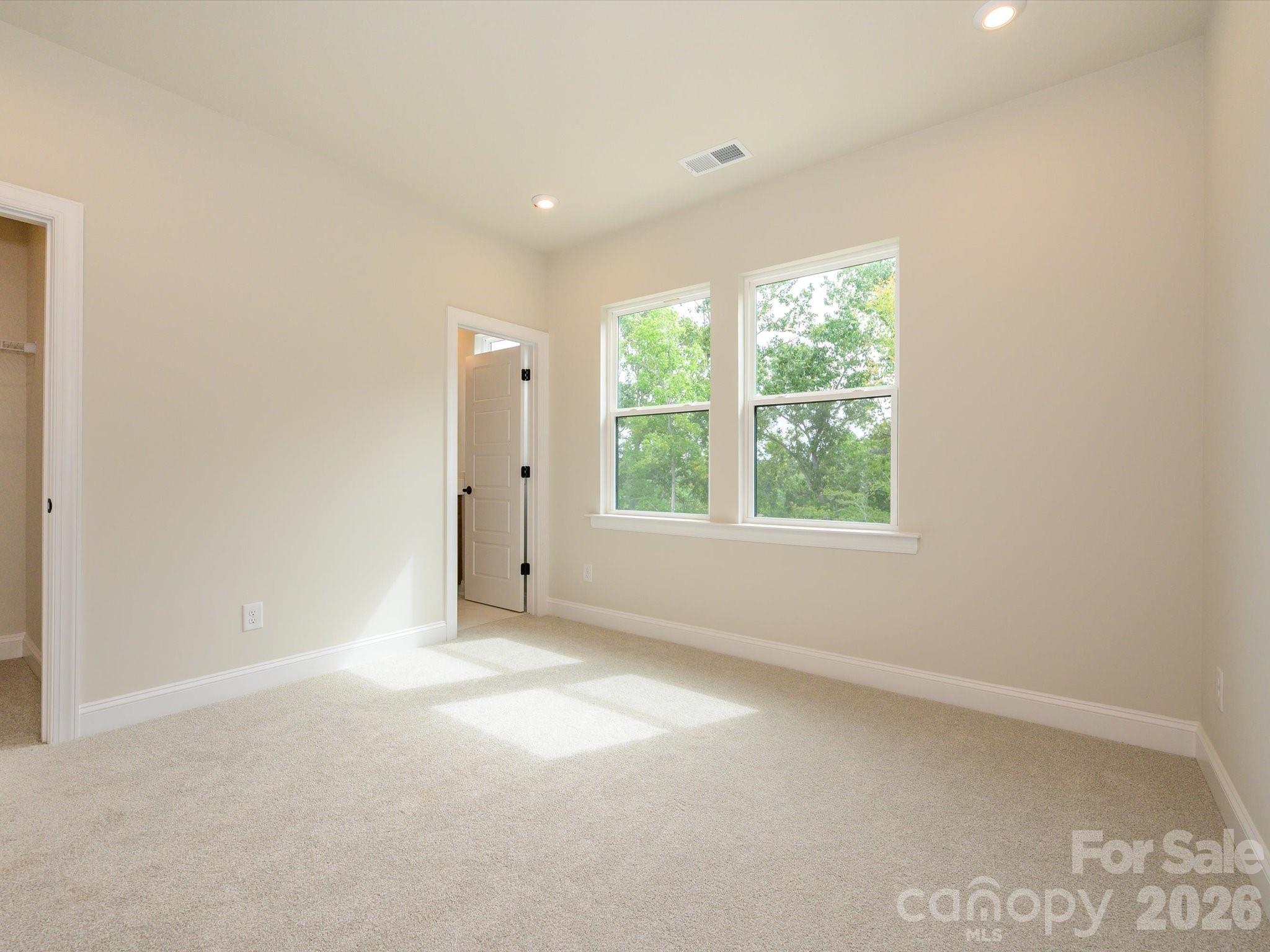 412 Old Town Vlg Road Waxhaw, NC 28173 - Photo 20 of 29 an empty room with windows