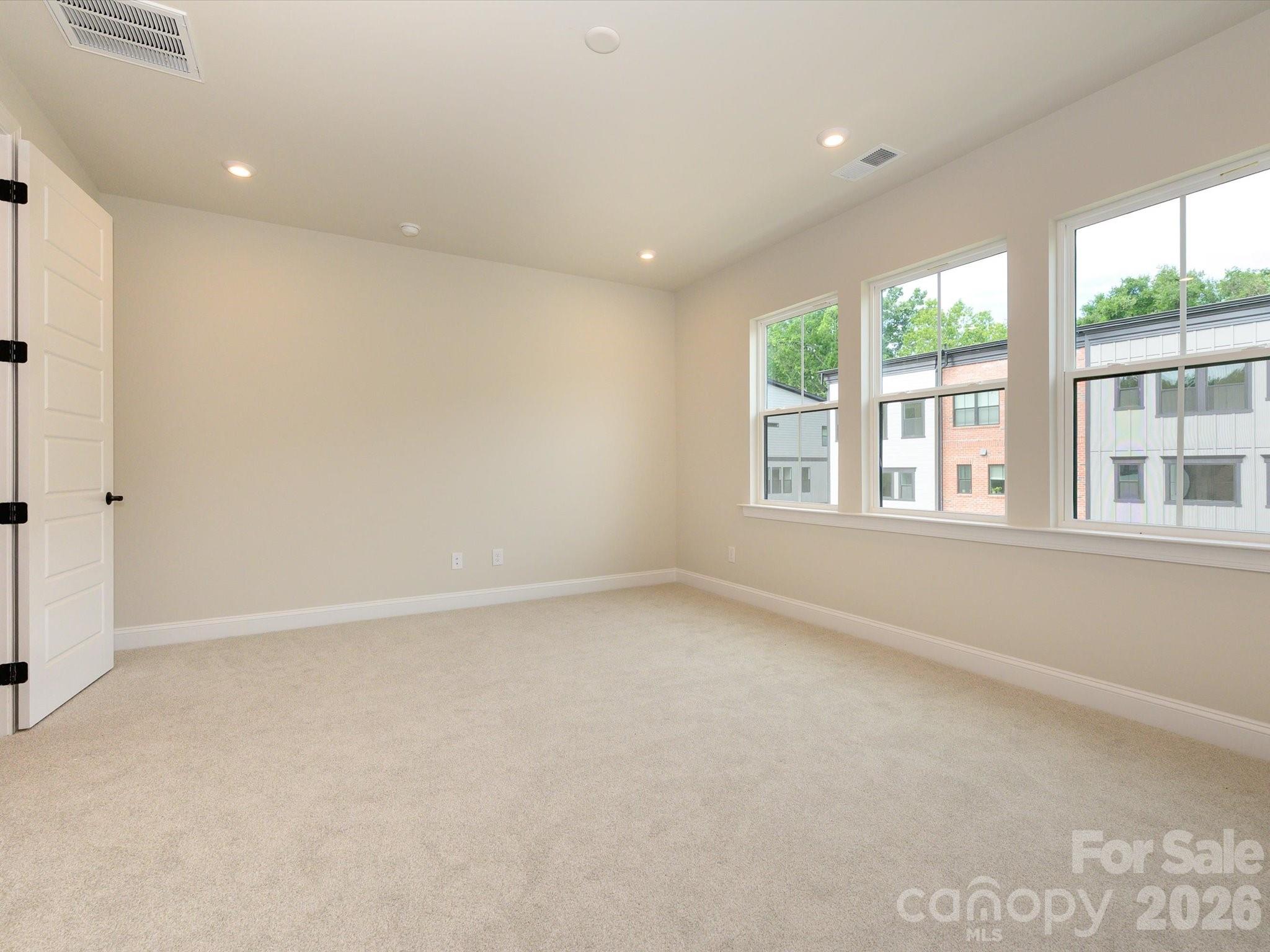 412 Old Town Vlg Road Waxhaw, NC 28173 - Photo 24 of 29 an empty room with windows