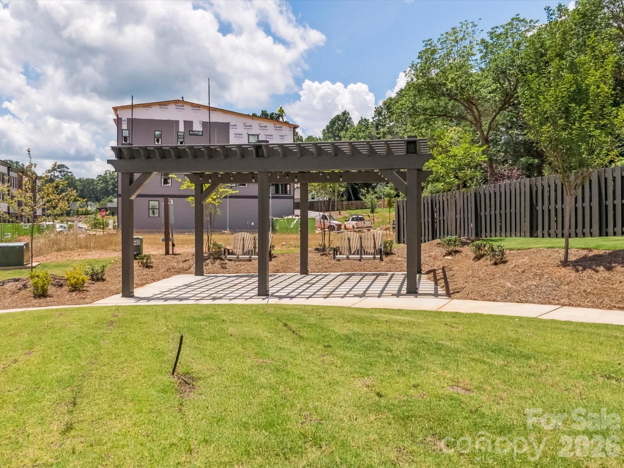 412 Old Town Vlg Road Waxhaw, NC 28173 - Photo 29 of 29 a view of a house with a yard and sitting area