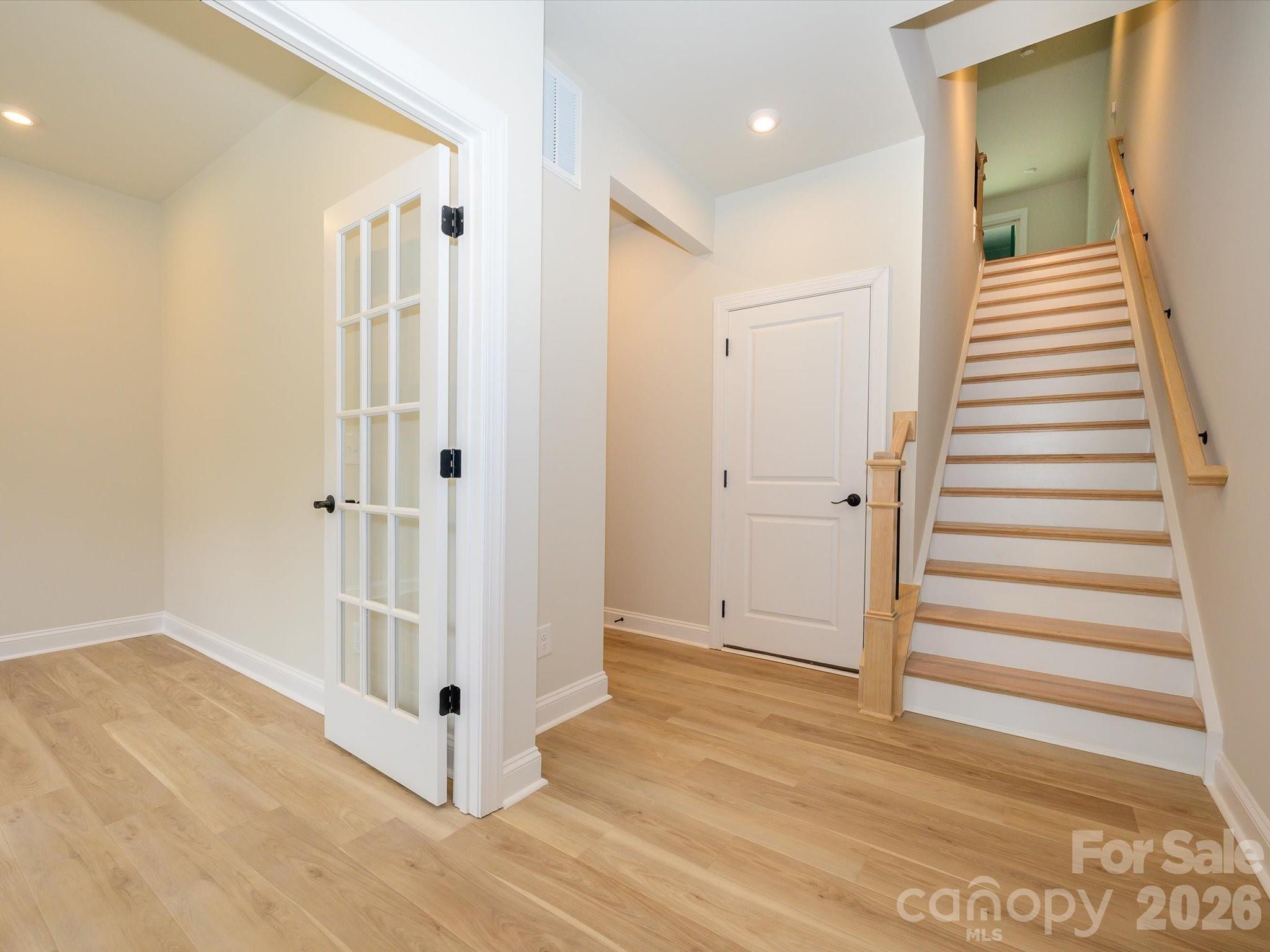 412 Old Town Vlg Road Waxhaw, NC 28173 - Photo 4 of 29 a view of a hallway with wooden floor and entryway
