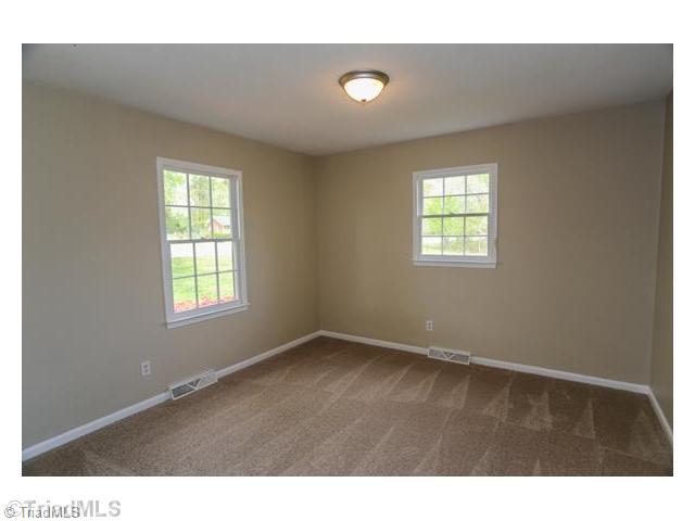 1802 Pleasant Ridge Road Greensboro, NC 27409 - Photo 14 of 16 Exterior Front.