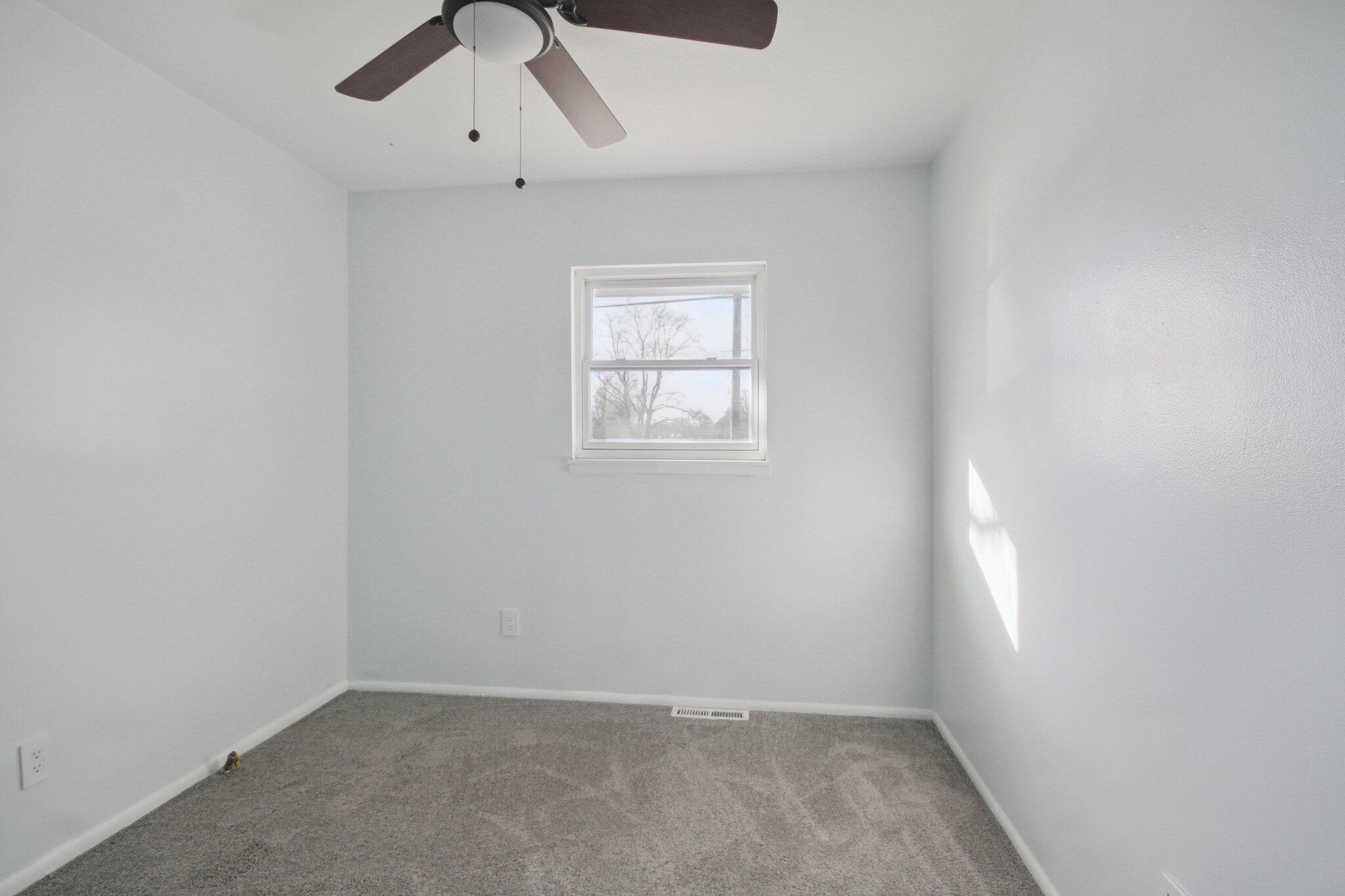 2355 McCool Road Portage, IN 46368 - Photo 12 of 19 an empty room with a window