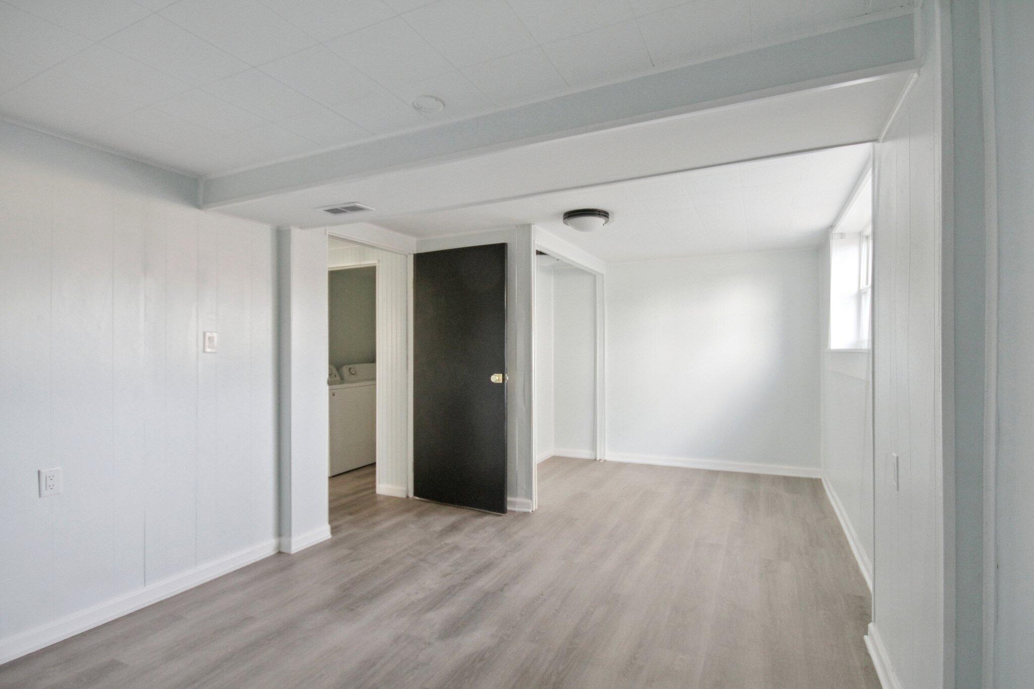 2355 McCool Road Portage, IN 46368 - Photo 18 of 19 a view of an empty room with wooden floor