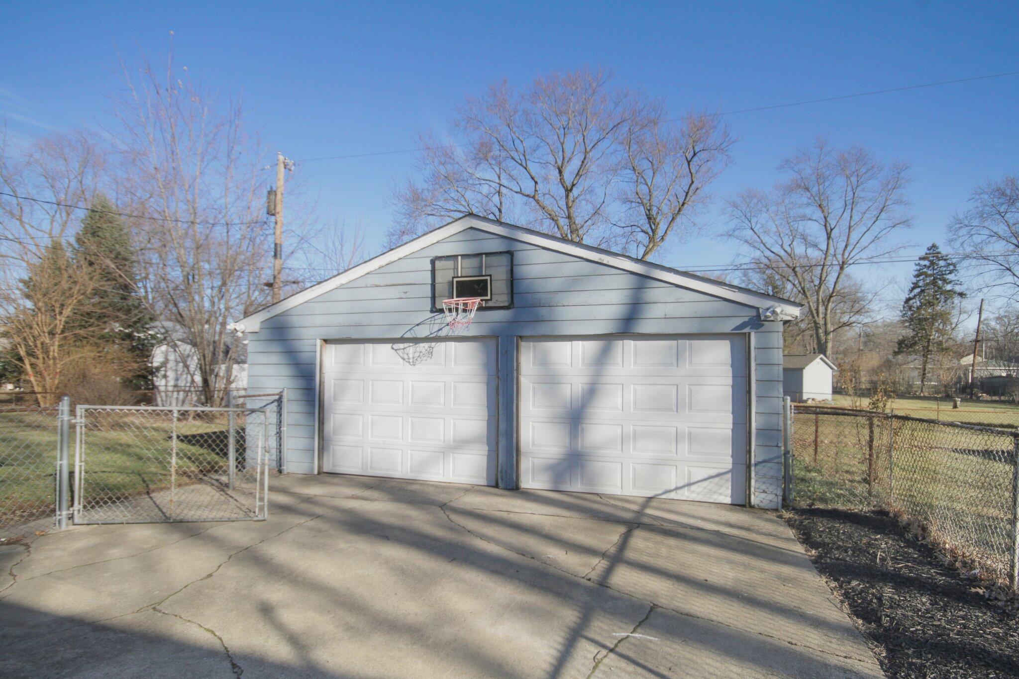 2355 McCool Road Portage, IN 46368 - Photo 4 of 19 a front view of a house with a yard