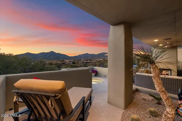 a swimming pool with outdoor seating yard and patio