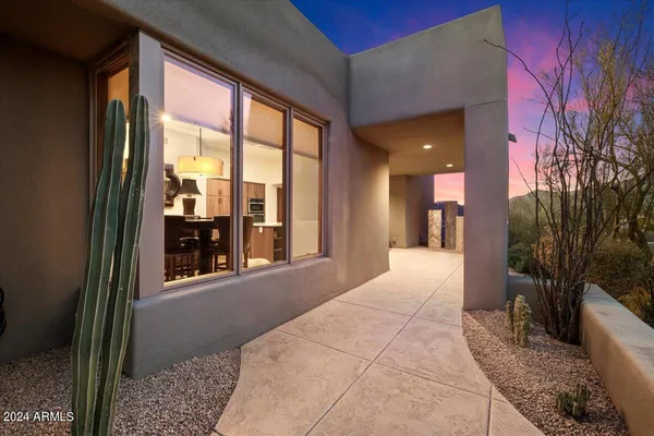 a view of a livingroom with furniture and patio