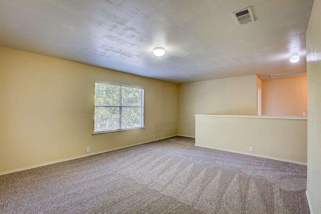 1720 Desperado Road Fort Worth, TX 76131 - Photo 26 of 40 a view of an empty room with a window