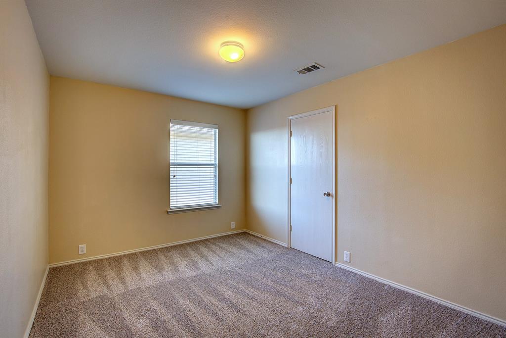 1720 Desperado Road Fort Worth, TX 76131 - Photo 27 of 40 a view of an empty room and window